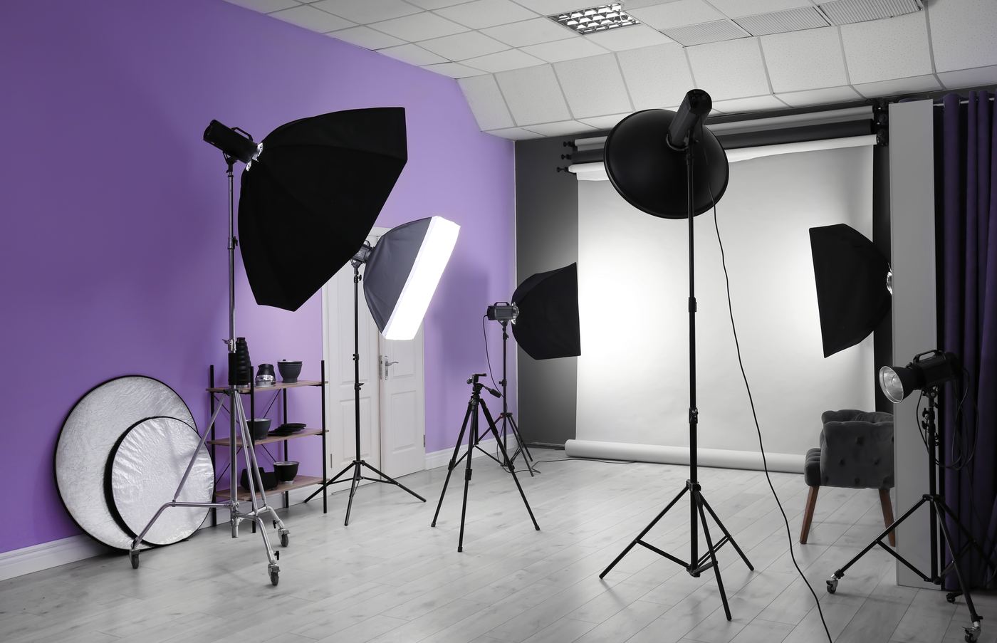 Professional content studio setup with purple-toned lighting